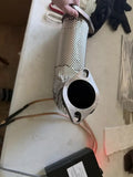 WRX downpipe skinned in 0.1mm 304 stainless foil, with the spot welder used to seam it
