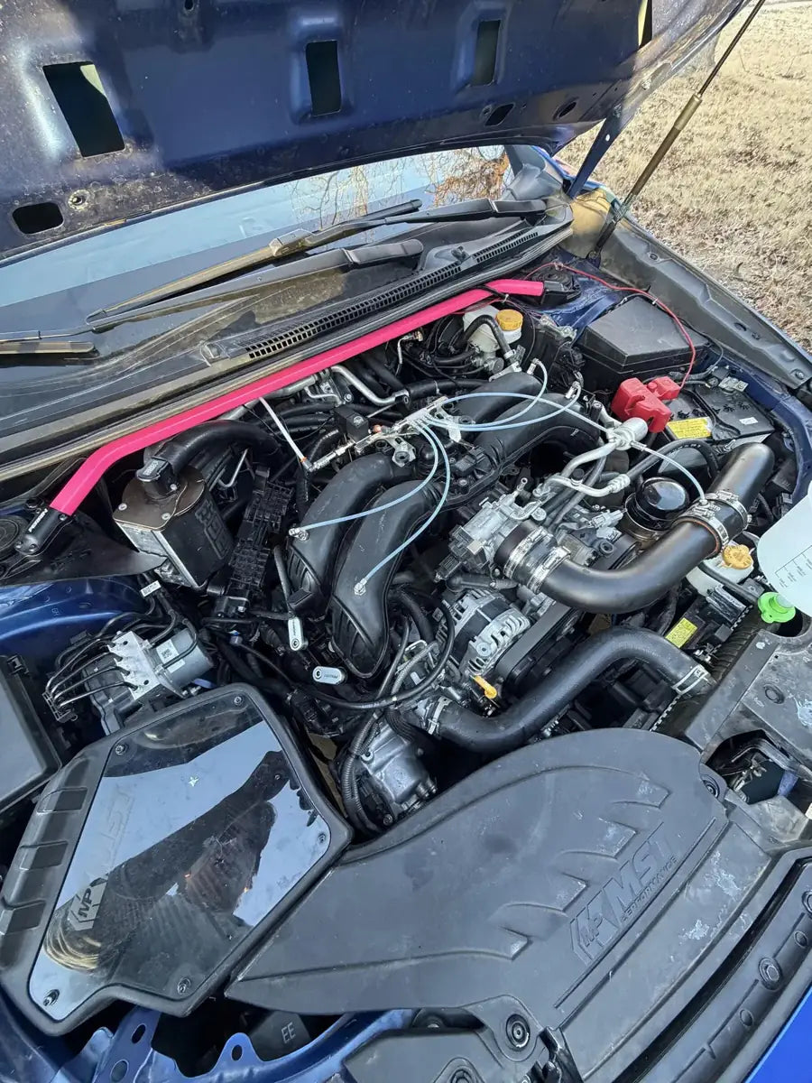 BRZ manifold adapter installed on a Subaru WRX engine